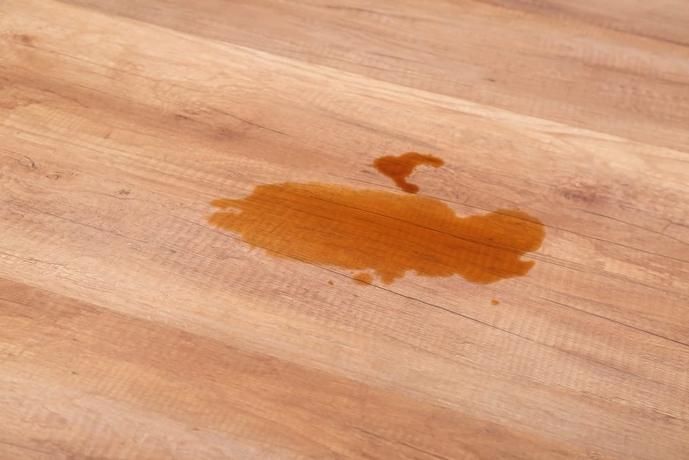 Get rid of stains on hardwood floors.